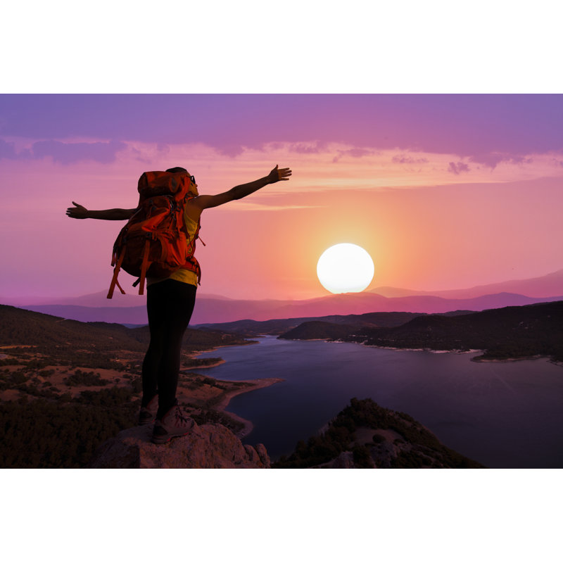 Silhouette of a female backpacker, 30cm H x 46cm W