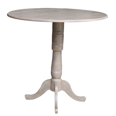 Hesston Extendable Round Solid Wood Dining Table