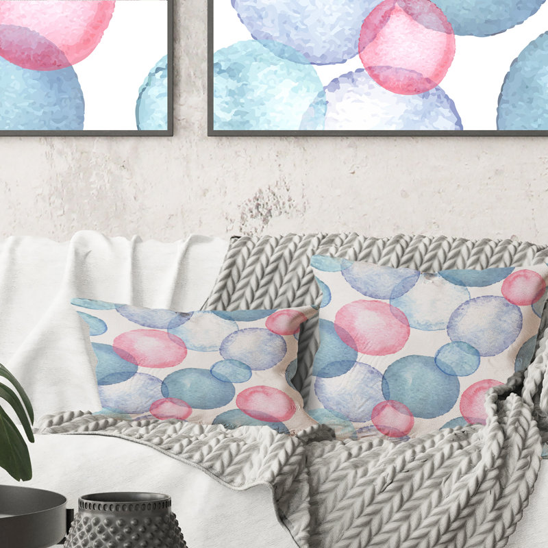 Coussin bleu et rose avec imprimé moderne