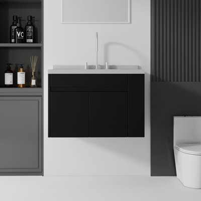 Meuble-lavabo suspendu de 76 cm (30 po) en contreplaqué avec lavabo en céramique (trou de trop-plein), comptoir et dosseret en marbre reconstitué, portes à fermeture amortie, tablette latérale ouverte, noir
