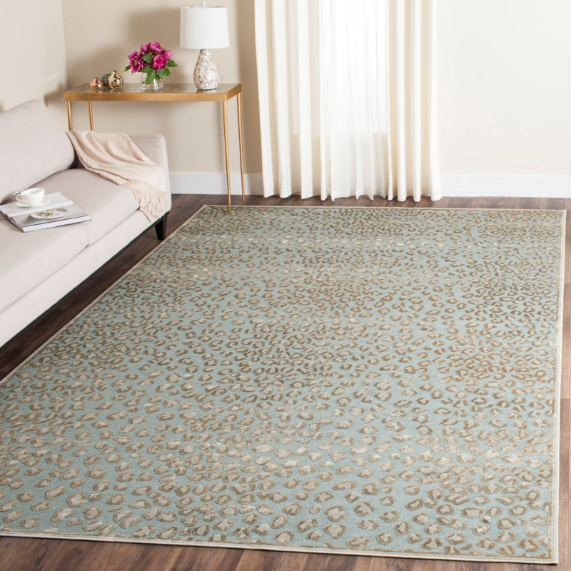 Banerjee Animal Print Area Rug in Stone/Aqua, Rectangle 5'3" x 7'6"