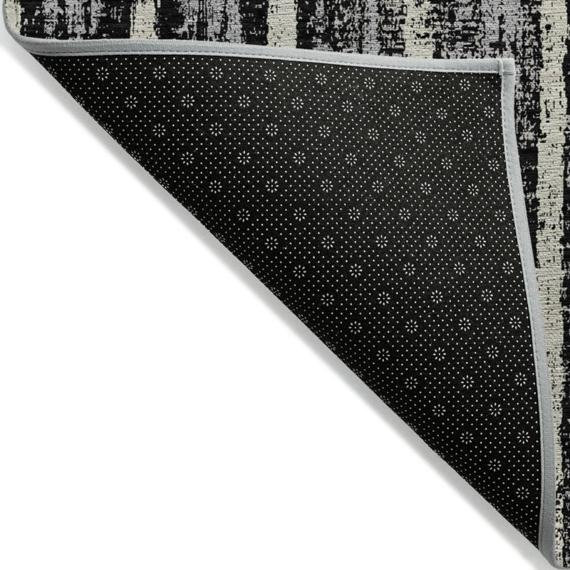 Tapis extérieur lavable rayé noir et gris 5 pi x 8 pi