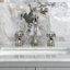 Robinet de salle de bain à deux poignées et à 3 trous à fixation sur comptoir avec bonde mécanique Kingston Brass-70060751