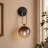 Dimmable Armed Sconce