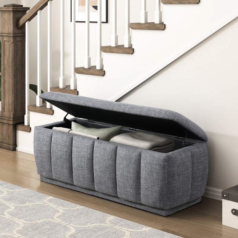 Banc de rangement texturé gris avec cadre intérieur en contreplaqué, coussin et tissu en mousse douce encadrés