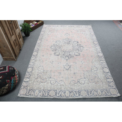 Elegant Vintage Turkish Rug in Pastel Pink with Floral Patterns for Timeless Home Decor