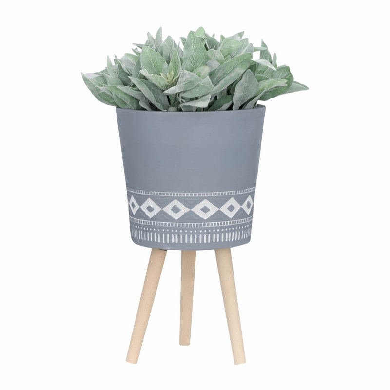 Pot à fleurs avec trou de drainage et pieds en bois