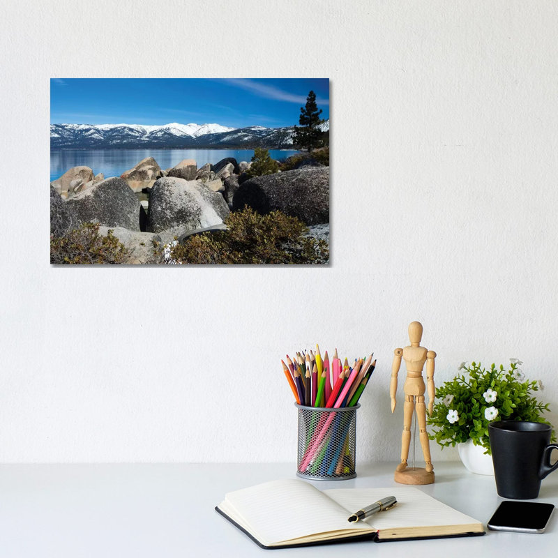 Rocks At The Lakeshore With Mountain Range In The Background, Lake Tahoe, California, USA - Wrapped Canvas Print