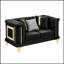 Canapé luxueux deux places en velours capitonné avec des accents métalliques et une texture brodée pour une décoration de salon élégante