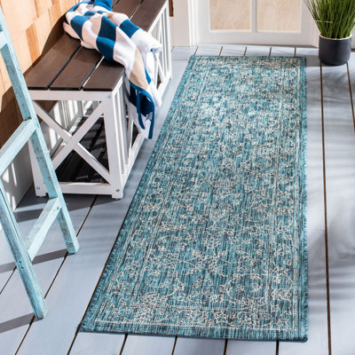 Tapis d'intérieur / extérieur à motif floral Cherene