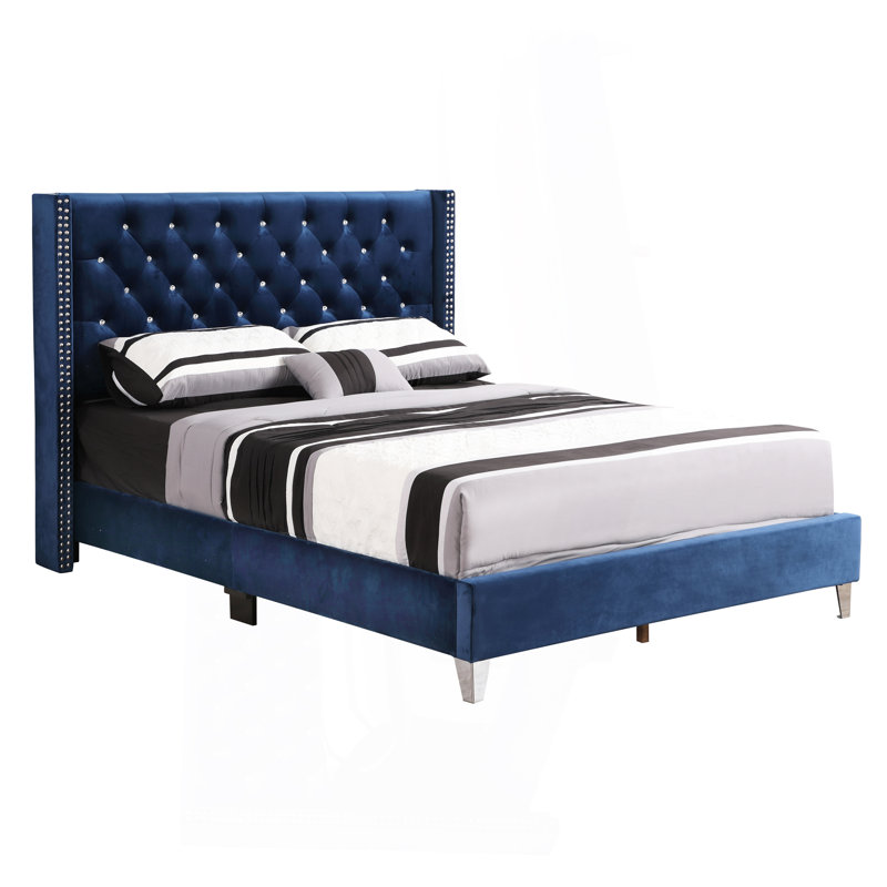 Élégant grand lit tapissier bleu marine