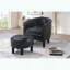 Fauteuil d'appoint en similicuir avec repose-pieds, dossier courbé et pieds noirs