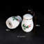 Ensemble salière et poivrière en porcelaine Rhona, embossage floral et bordure or 24 carats