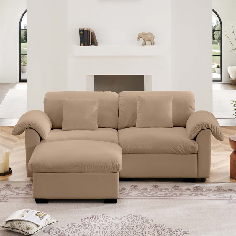 Luxueux canapé rembourré en velours avec un confort moelleux, parfait pour créer une atmosphère confortable et invitante dans n'importe quelle maison.