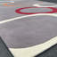 Tapis mauve / blanc / rouge en laine touffeté à la main
