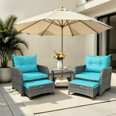 Constantino 2-Person Outdoor All-Weather Wicker Conversation Set with Ottomans and Tempered Glass Coffee Table