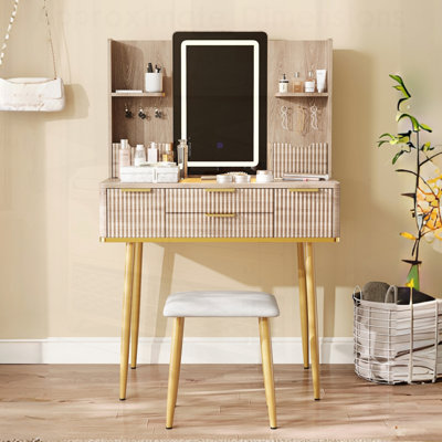 Bureau de coiffeuse à 4 tiroirs avec miroir à DEL et détails sculptés, table de maquillage cannelée avec pieds en métal et tabouret en polyuréthane, coiffeuse sculptée avec rangement pour bijoux pour la chambre à coucher
