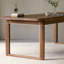 Table rectangulaire minimaliste en noyer.-432144165