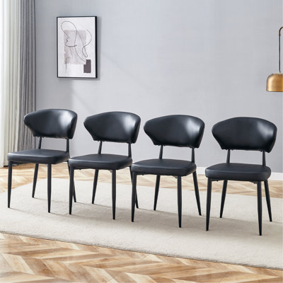 La chaise de salle à manger minimaliste et ergonomique, avec un dossier incurvé pour une conception confortable, libère une nouvelle position assise confortable et minimaliste. Un paquet de 4.