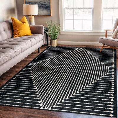Tapis moderne noir et crème à motif géométrique