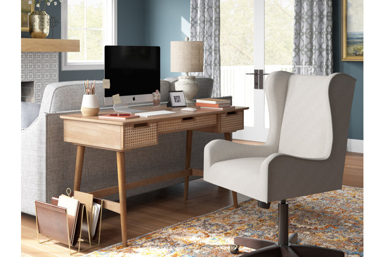 transitional-style living room with a wood desk along the back of a gray sofa