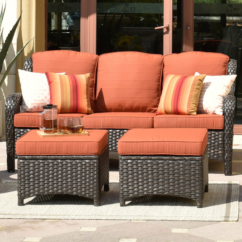 Ensemble de conversation avec canapé en rotin 3 pièces Gretna, Cadre brun / coussin rouge-orange