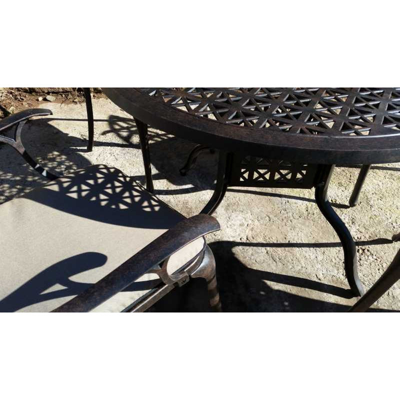 Ryne 4 - Person Patio Dining Set with Round Table , Cushions Included, Bronze