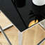 Table basse élégante et moderne avec plateau en verre trempé et structure en acier inoxydable, parfaite pour le salon et la chambre à coucher