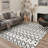 Abrahamson Zigara Geometric Machine Washable White / Black Onyx Indoor Area Rug with Non-Slip Backing-128992584