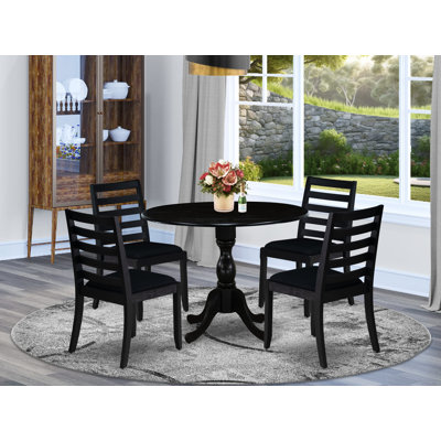 L'ensemble de salle à manger comprend une table de cuisine ronde avec plateau noir brossé et chaises empilables en tissu de polyester, noir brossé