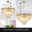 Lustre doré gradué à 8 lumières avec détails en cristal Gevan