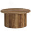 Élégante table ronde au centre, canapé, table d'appoint et table basse