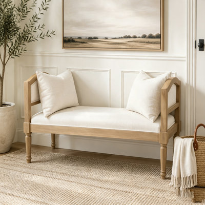 Banc rembourré avec pieds tournés