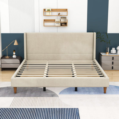 Lit plateforme tapissier avec structure en bois