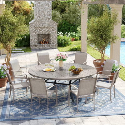 8-Person Round Patio Dining Set with 60" Dining Table and 8 Stackable PVC-coated polyester Chairs