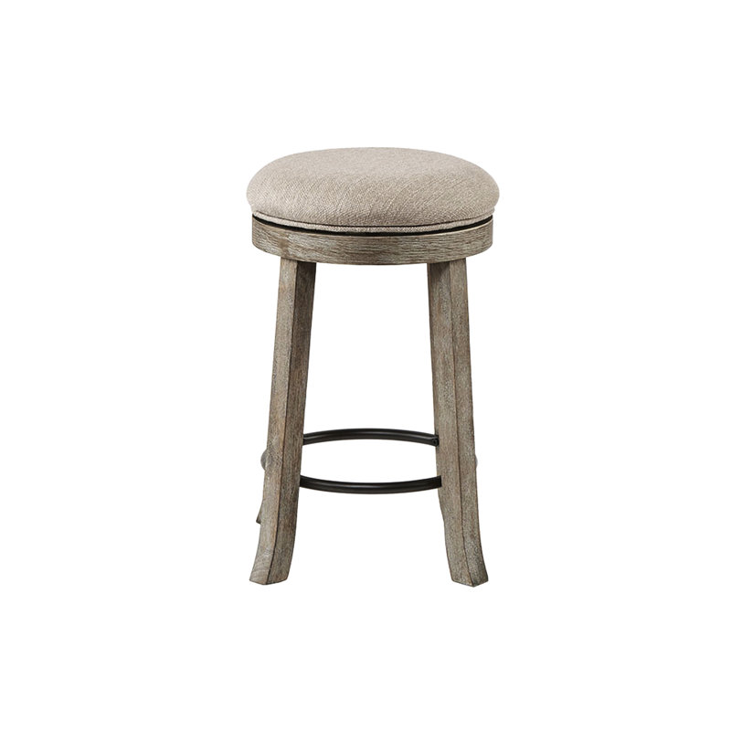 Tabouret texturé gris rembourré avec plaque de protection en bronze foncé et comptoir rotatif avec structure légèrement démodée