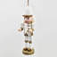 Ornements en forme de casse-noisette en bois fabriqués à la main pour Noël, parfaits pour la décoration traditionnelle et festive.