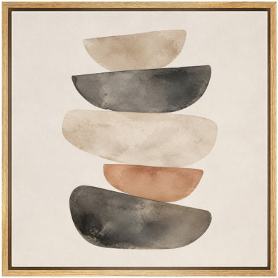 Impression sur toile encadrée, style minimaliste, avec des formes empilées de pierres beiges et noires neutres.