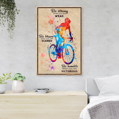 «Colorful Man Riding Bike - Be Strong When You Are Weak», reproduction d'art graphique sur toile tendue
