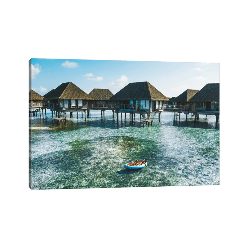 Maldives Resort Bungalows Girl Pool Float by James Vodicka - Wrapped Canvas Print, 101.6 cm H x 66.04 cm W