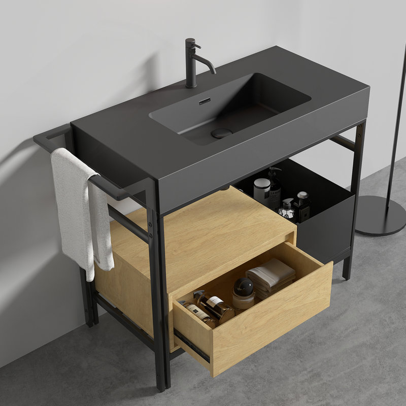 Meuble-lavabo modulaire de 36 po de style industriel. Ce meuble-lavabo est doté d'une structure en métal robuste rehaussée d'éléments en bois chaleureux et est surmonté d'un bassin en pierre artificielle sans couture et facile à nettoyer. KD