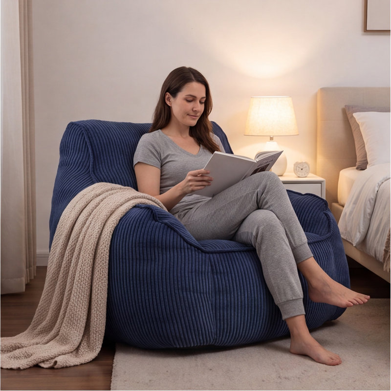 Fauteuil à billes surdimensionné en velours côtelé bleu foncé avec accoudoirs - rembourré