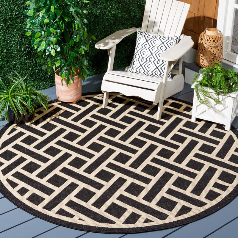 Arneshia Floral Brown/Tan Indoor/Outdoor Area Rug, Round 6'7"