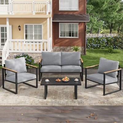 Ensemble de mobilier de patio 4 pièces, canapé d'angle extérieur gris | Table basse Canapé d'extérieur résistant aux intempéries | Coussins d'accoudoirs anti-brûlure en bois | Parfait pour le jardin, le balcon, la véranda
