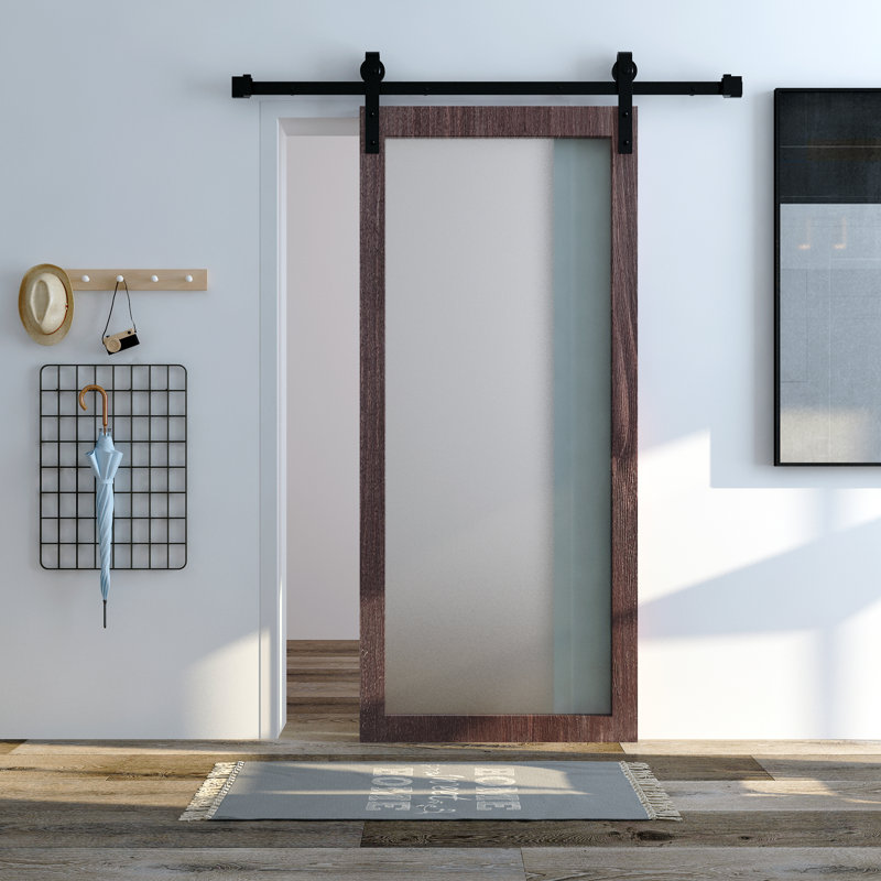 Porte de grange en verre avec quincaillerie d'installation
