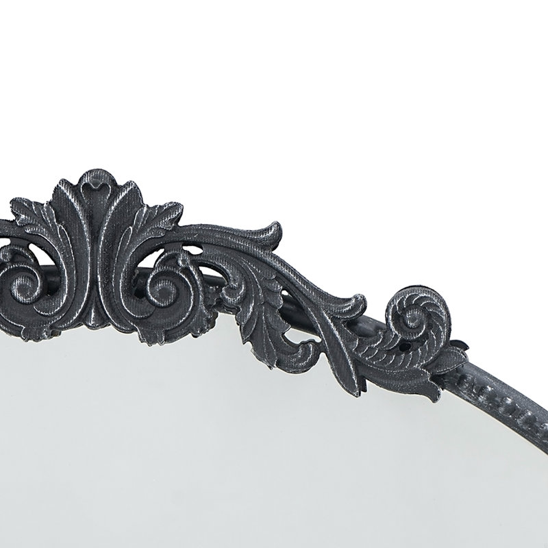 Miroir avec forme ronde et cadre d'inspiration baroque