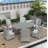 Dut 6 - Person Wicker Patio Dining Set with Oval Table , Cushions Included