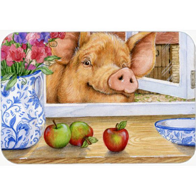 Le porc de la caroline atteint la pomme de la planche à découper en verre