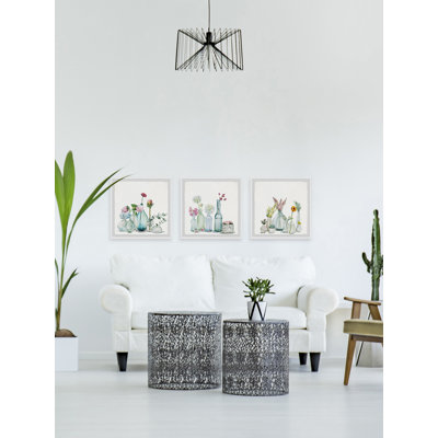 Triptyque de bouteilles florales