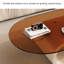 Simple light luxury oval glass coffee table-105170397